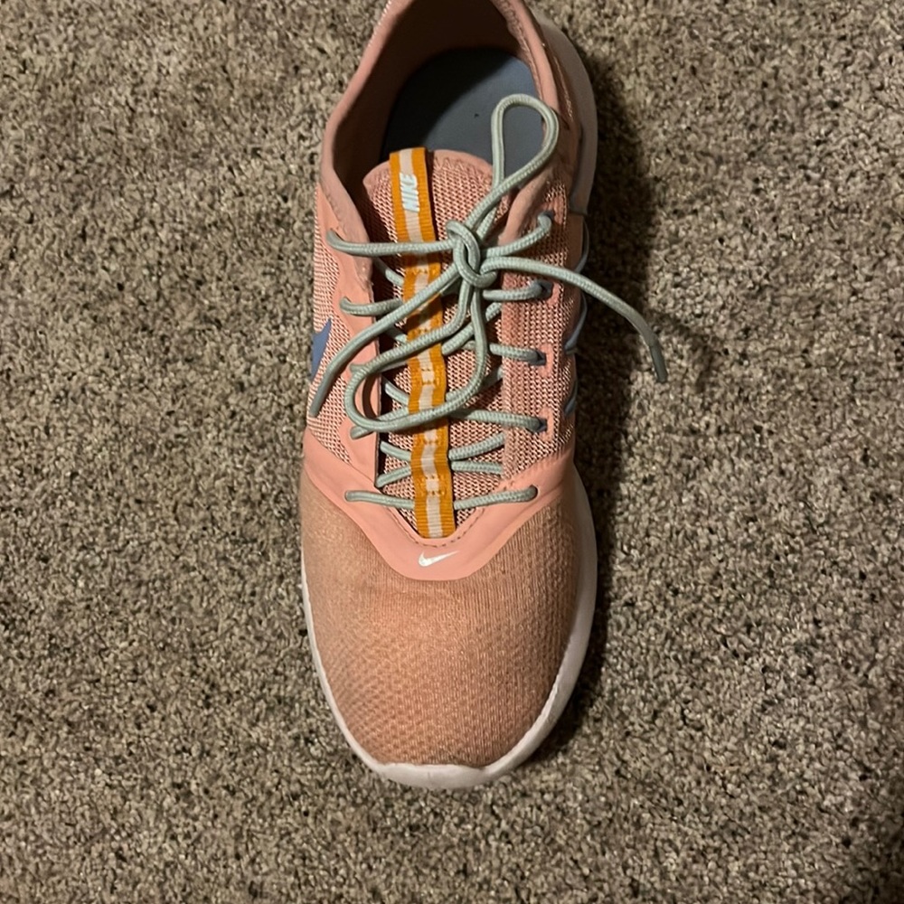 Nike orangish peachish color with light blue check in good shape just dirty
